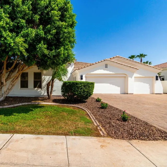 Front Of House With Fresh Paint And Drought Tolerant Landscaping